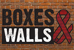 Boxes & Walls against a brick wall.