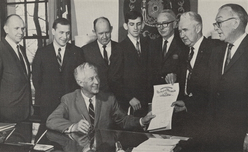 Photo of Governor Knowles signing proclamation designation 1868 as Wisconsin State University-Whitewater’s (now UW-Whitewater) Centennial Year 