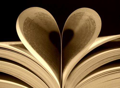 Book with pages bent into a heart