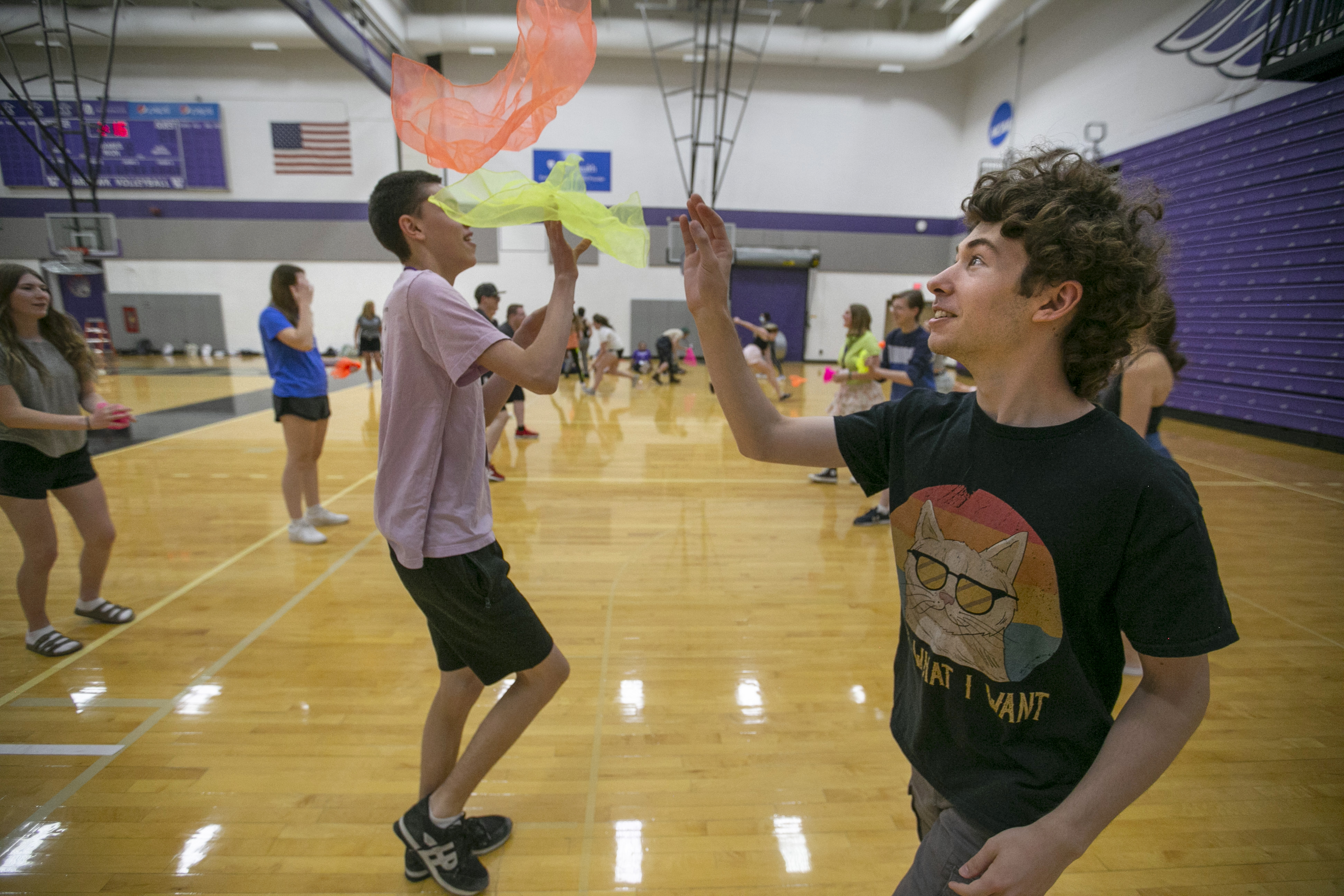 Students play in a gym.