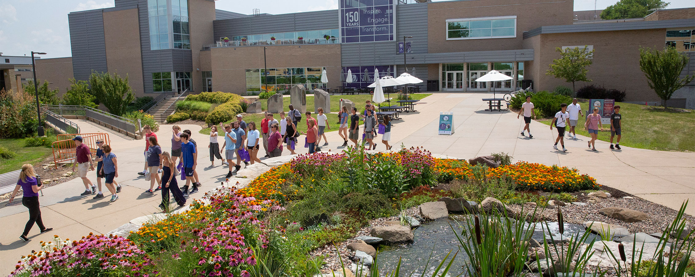  Potential Warhawks and their families take a tour on the UW-Whitewater campus.