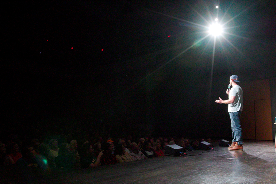 Charlie Berens performs on stage.