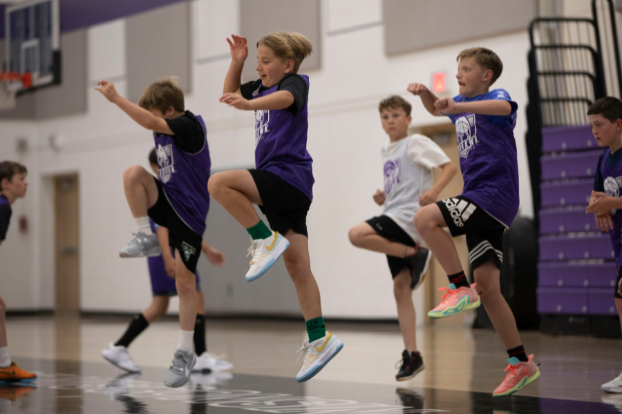 Basketball player shoots for a basket