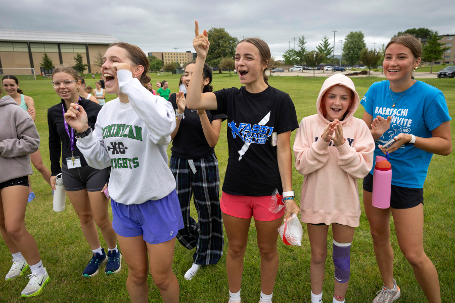 Camp participants running on the field: UW-WHITEWATER PHOTO/CRAIG SCHREINER