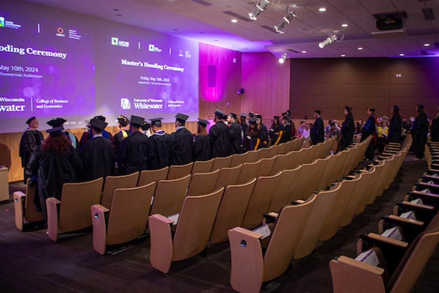 Students in standing to be hooded