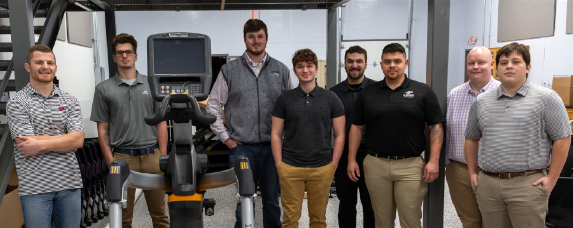 UW-Whitewater OESH students standing next to their safety project