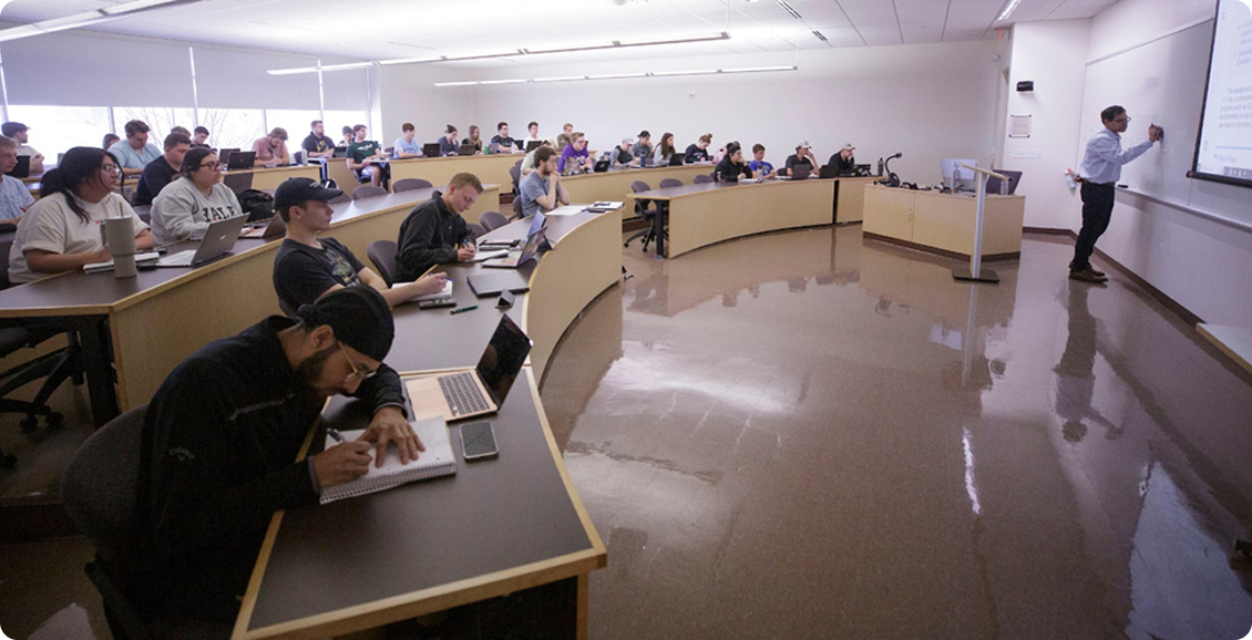 Bakhtear Talukdar, right, associate professor of finance and business law, in class in Hyland Hall on April 15, 2024. Finance repeatedly represents the largest major at UWW followed closely by Accounting and Marketing. (UW-Whitewater photo/Craig Schreiner)