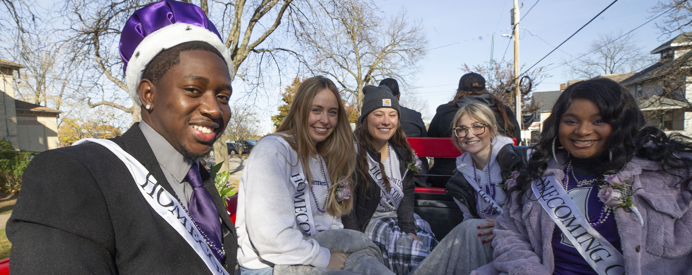 Homecoming court sits on a float during the parade.