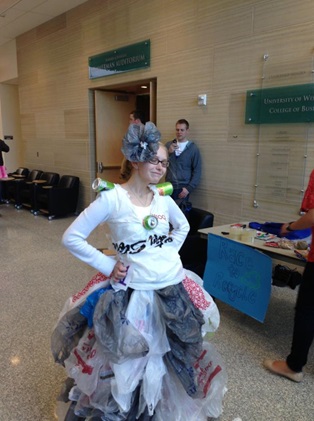 Woman dressed in recyclable clothing