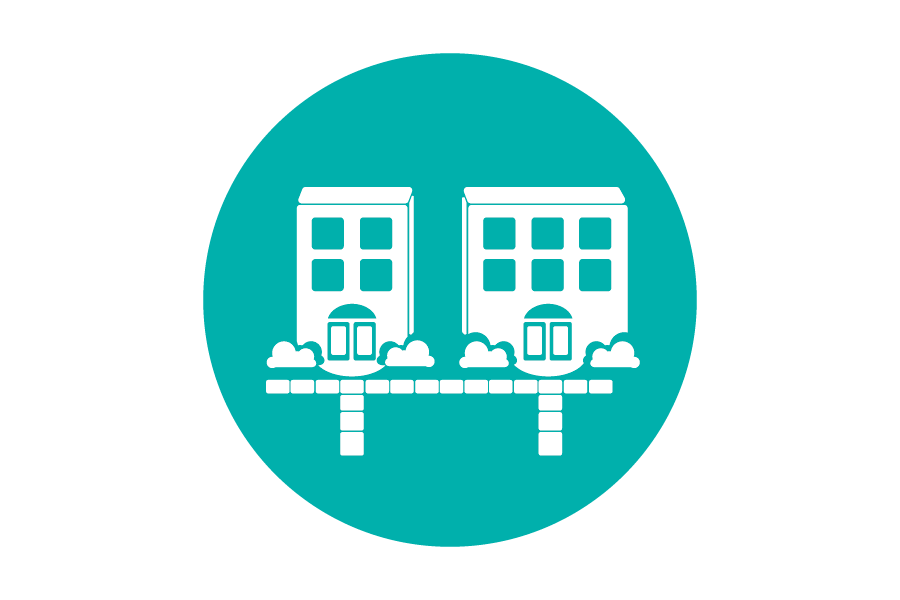 Teal circular icon with two residential buildings inside