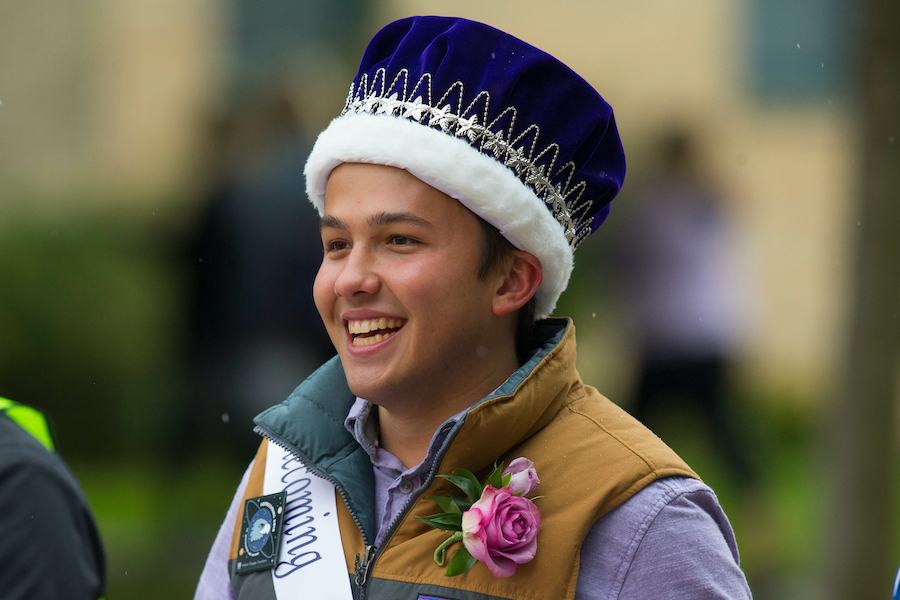 Alex Ostermann smiles while wearing the Homecoming crown.
