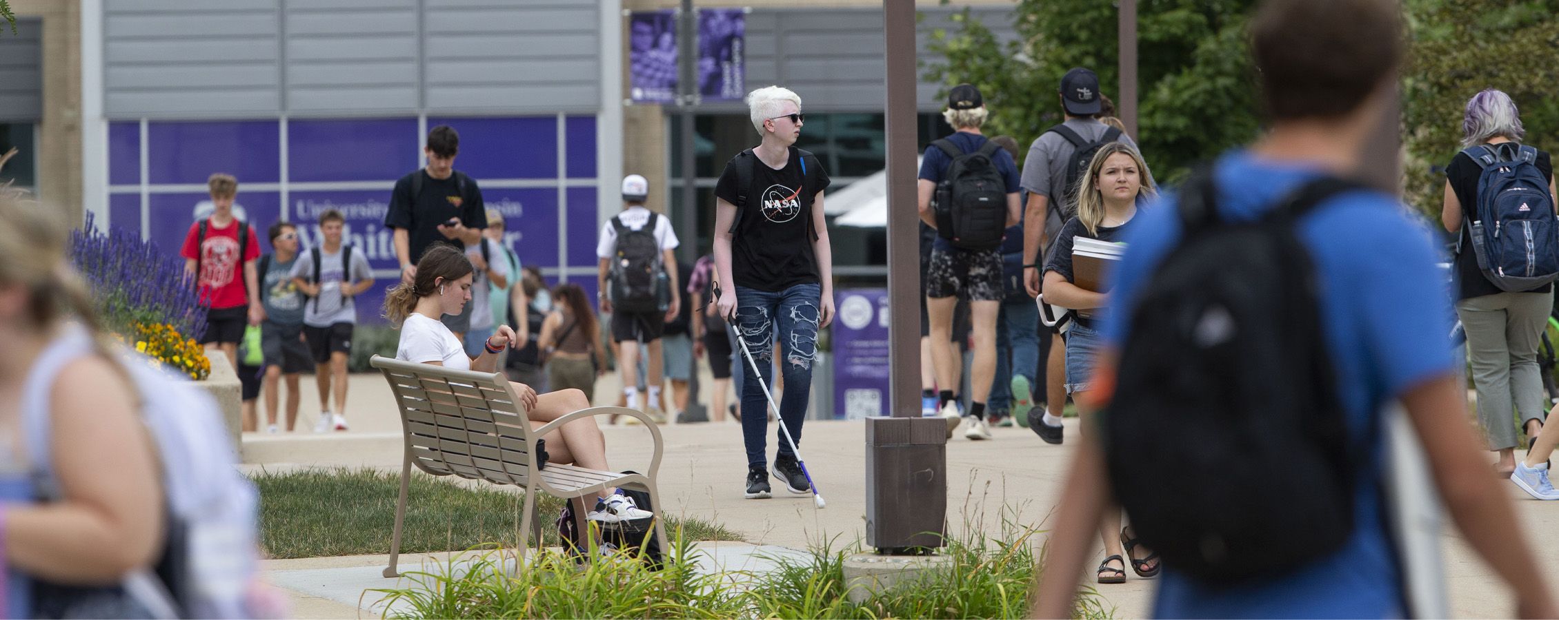 Students walk outside the University Center on the first day of class.