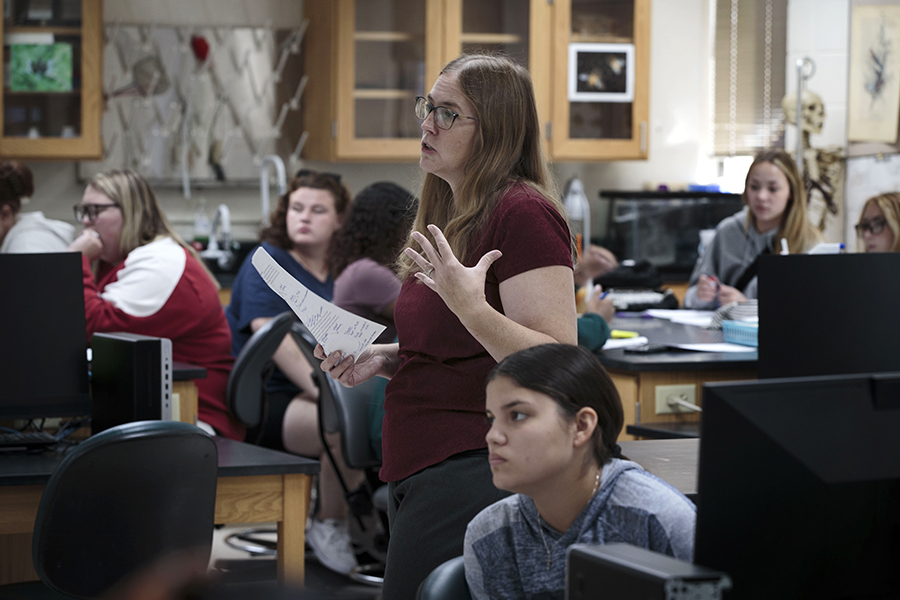 A faculty member teaches a class.