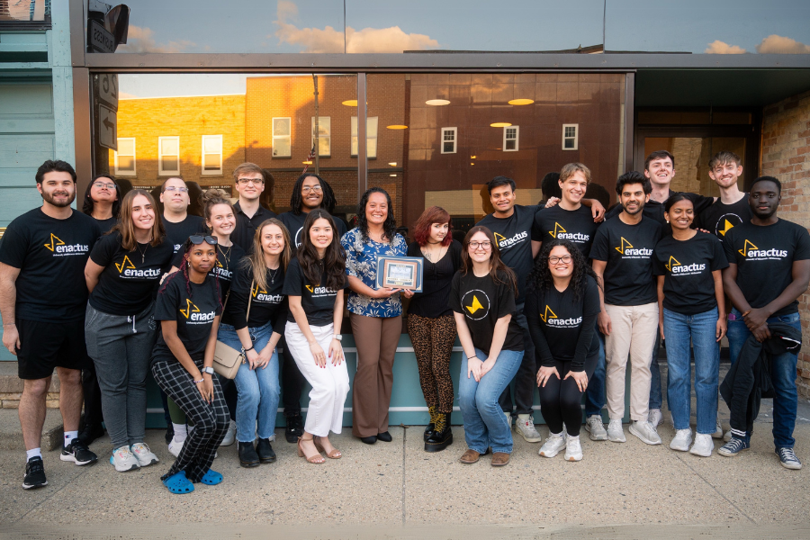 Enactus group posing for a photo.