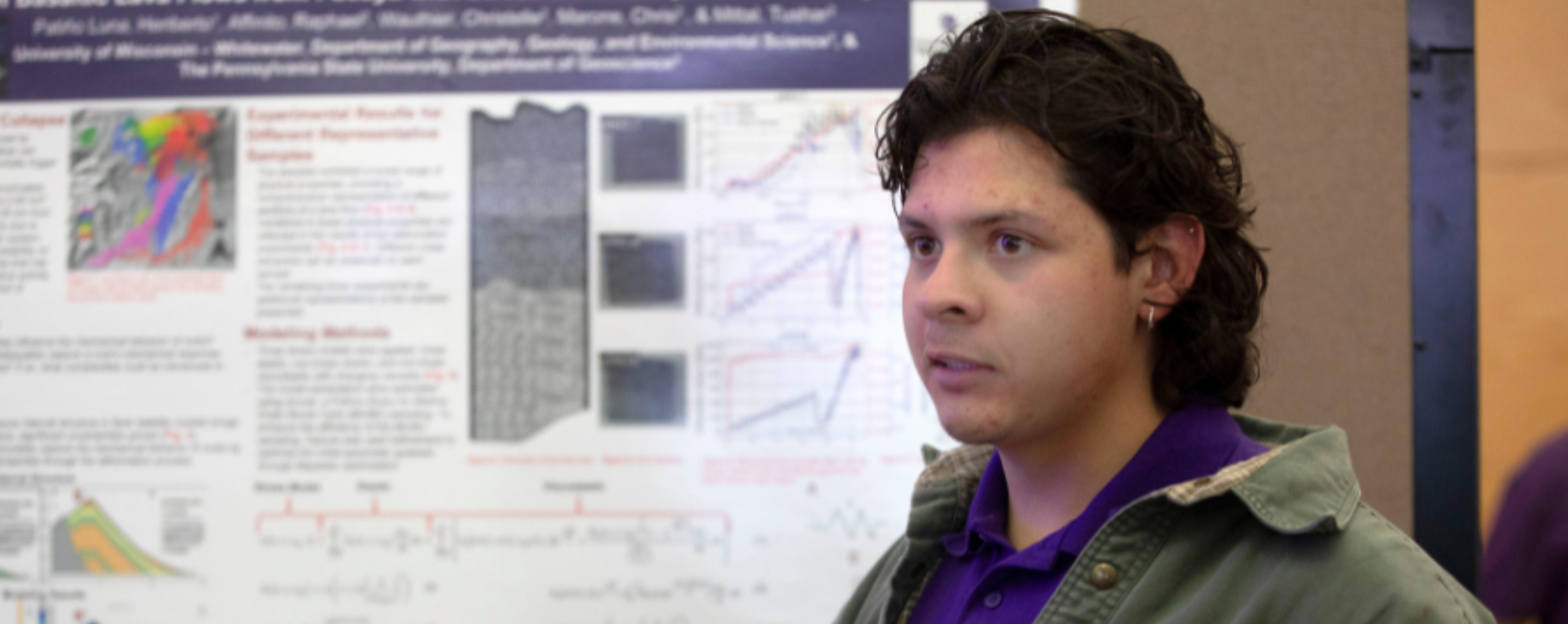 Beto looks ahead as he presents undergraduate research.
