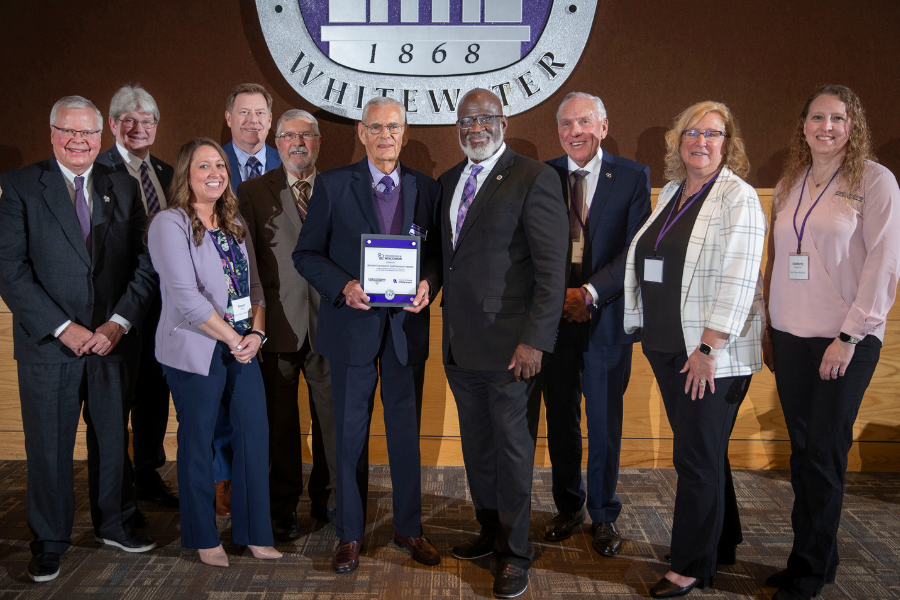 The Chancellor poses with several others in the University Center.
