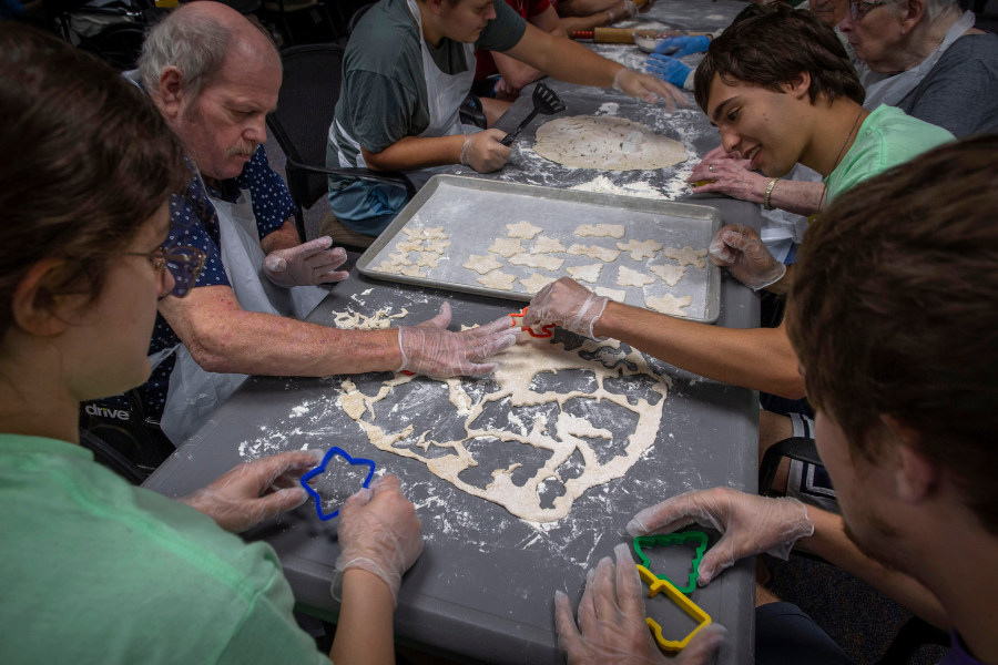 Students do work for a learning community.