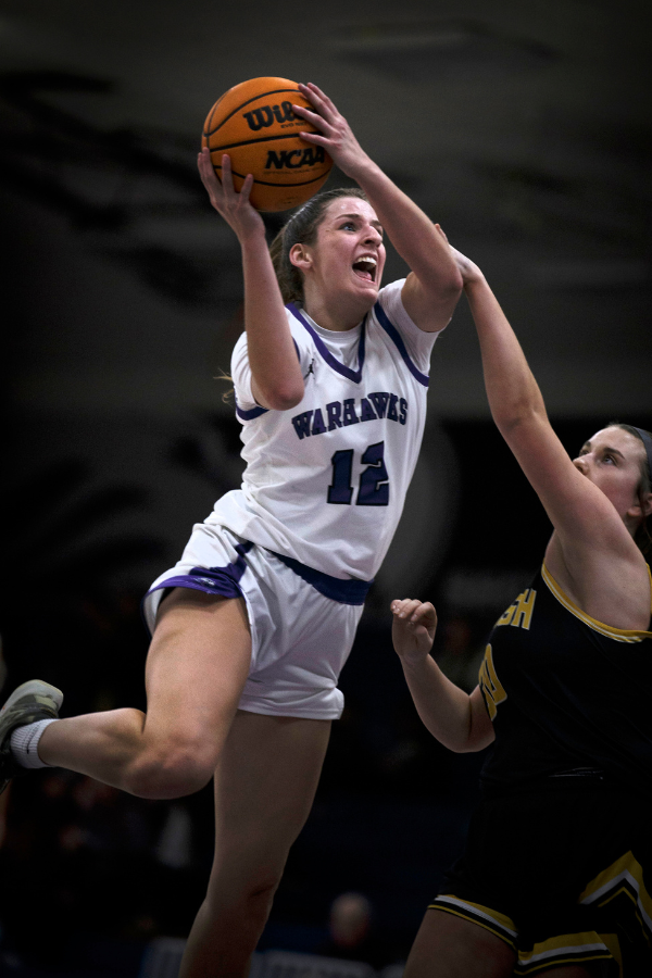 Student is about to score during basketball game. (UW-Whitewater photo/Craig Schreiner)