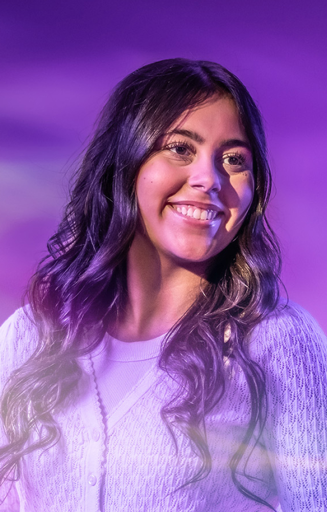 Young women poses for UW-Whitewater College of Business and Economics online 