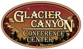 Logo of Glacier Canyon Conference Center is in an oval circle with a canon in the background with text.