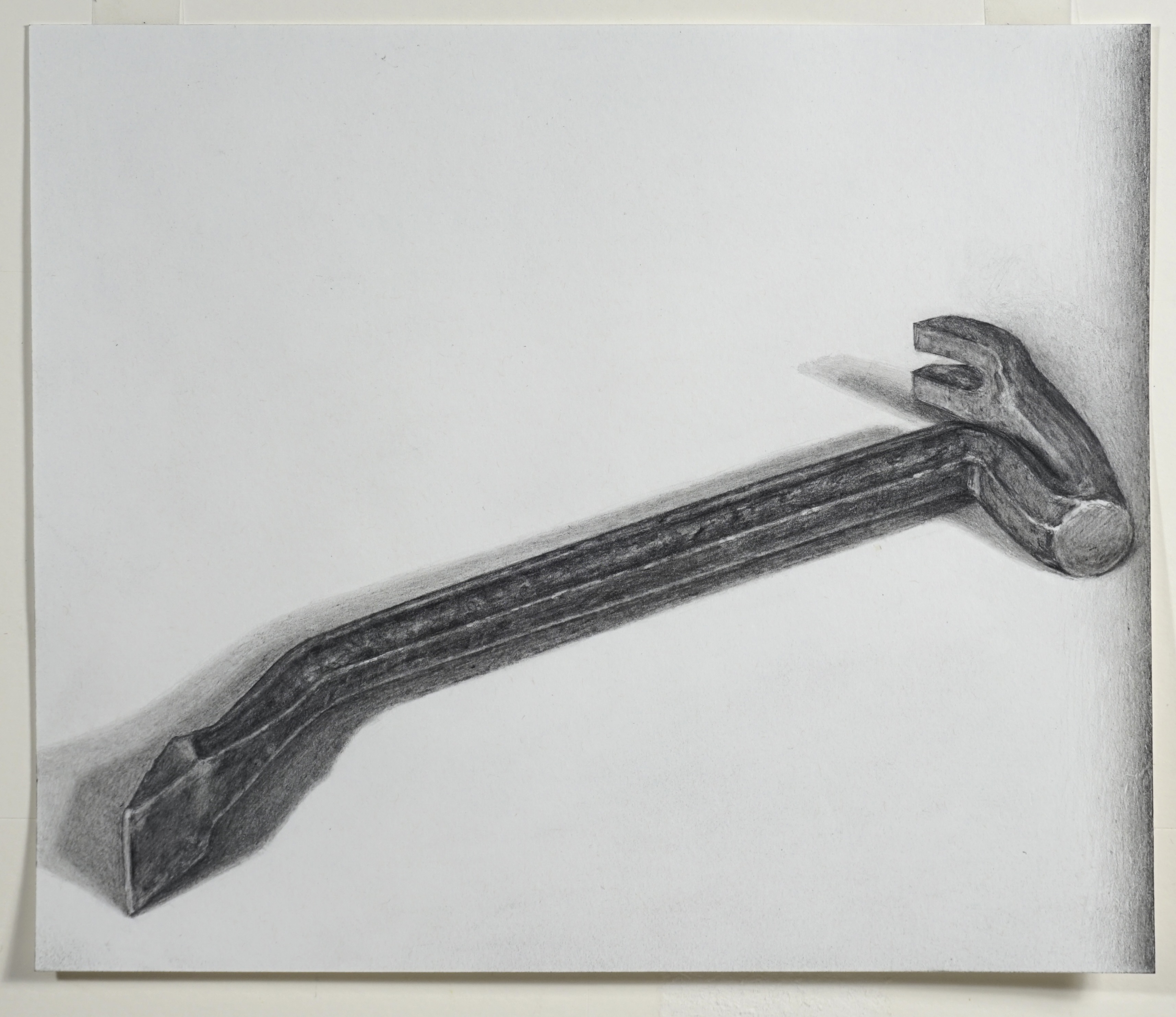 Pencil drawing of a hammer in black and white