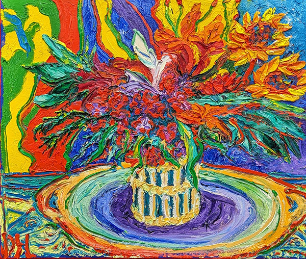 A painting of a brightly colored basket filled with flowers on a table with a rainbow tablecloth underneath it